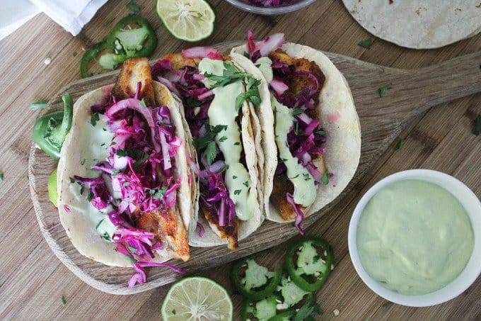 Blackened Tilapia Tacos with Red Cabbage and Avocado Crema