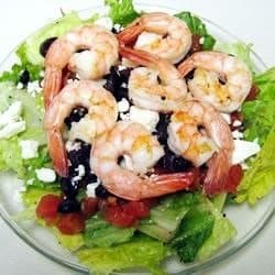 Greek-Style Shrimp Salad on a Bed of Child Spinach